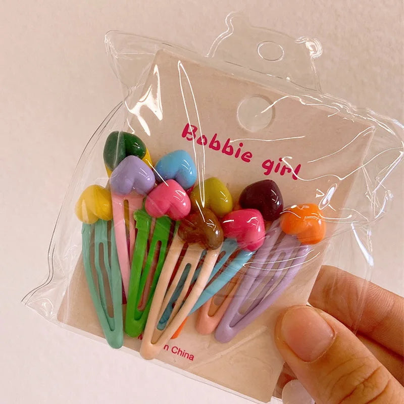 Lot de 10 mini pinces à cheveux mignonnes pour enfants.